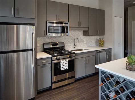 grey cabinets stainless steel appliances|kitchen with gray cabinets.